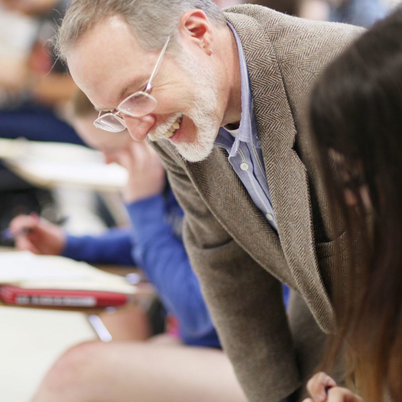 Professor assisting student