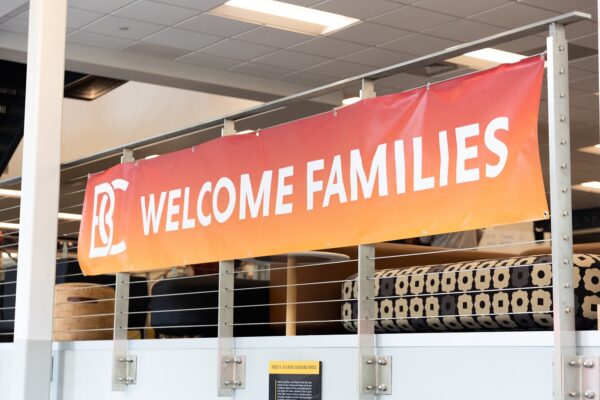 A banner that reads B-C Welcome Families hanging in the library