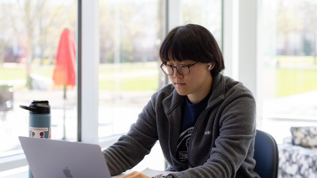 Student on laptop in Forrer Learning Commons