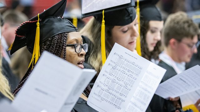 Graduates singing at Baccalaureate