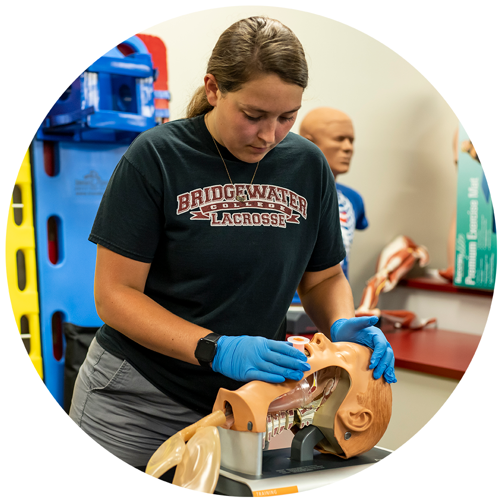 Student practicing air way training in athletic training class