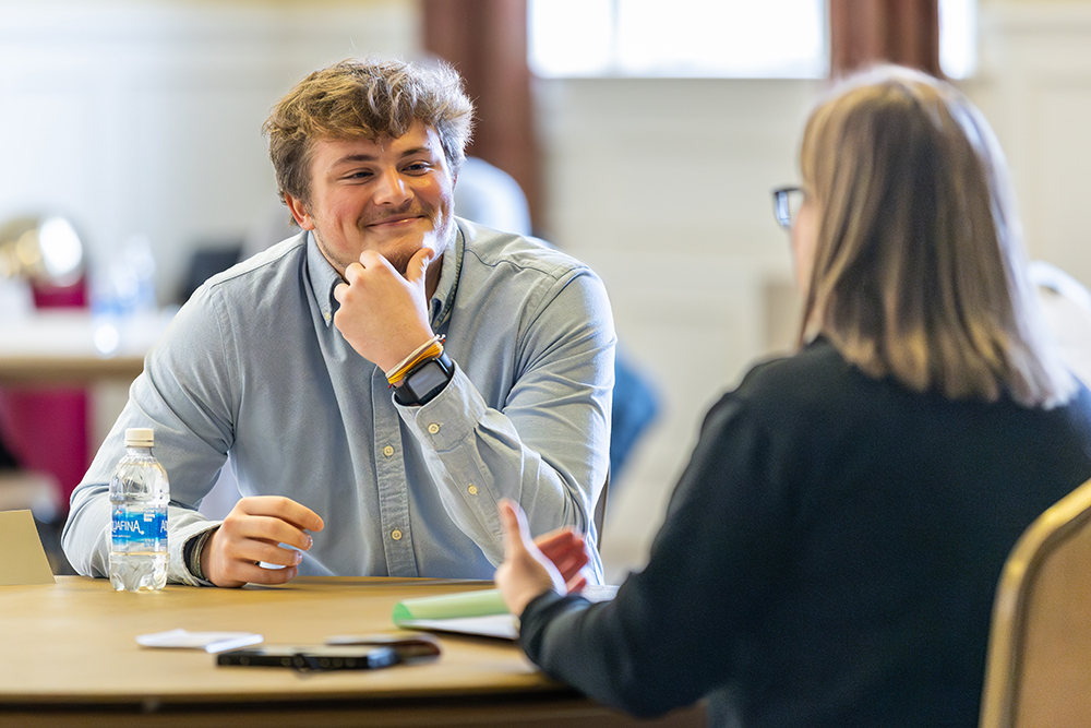 Student smiling during mock interview