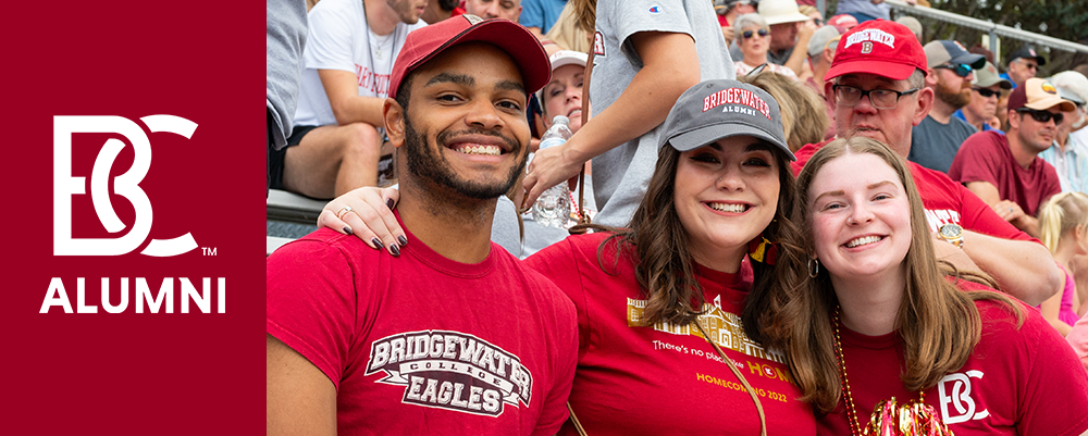 B-C Alumni logo to the left on a crimson background; three people wearing Bridgewater College t-shirts smiling for the camera