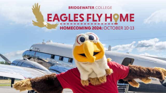 Bridgewater College. Eagles fly home. Homecoming 2024: October 10-13. Ernie standing with his arms spread like he is going to fly in front of a plane