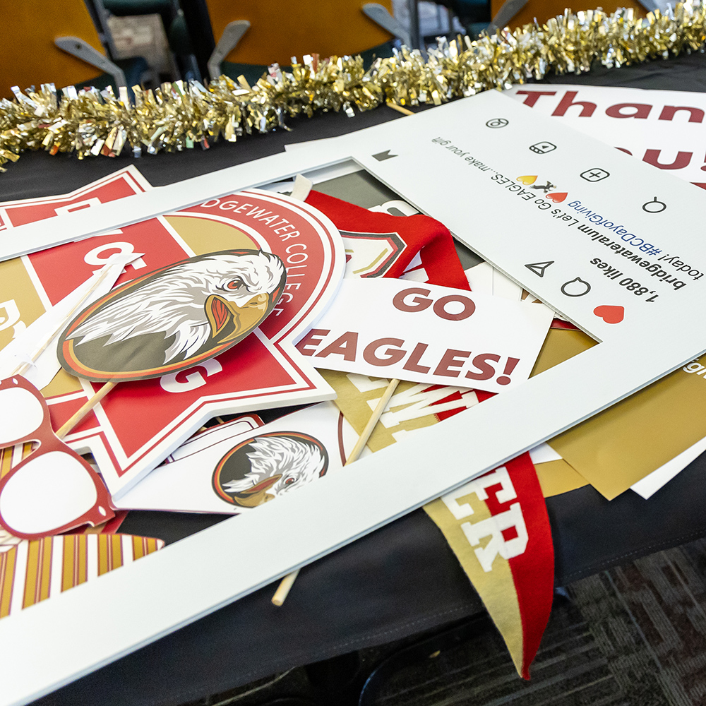 pile of Bridgewater College props for a photobooth