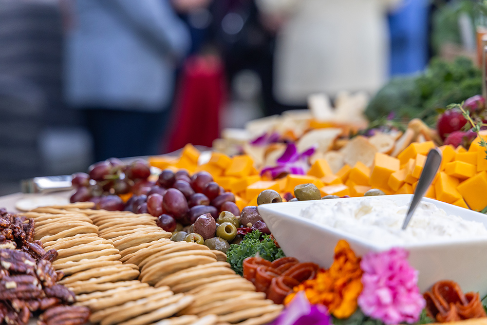 crackers, grapes, cheese and dip