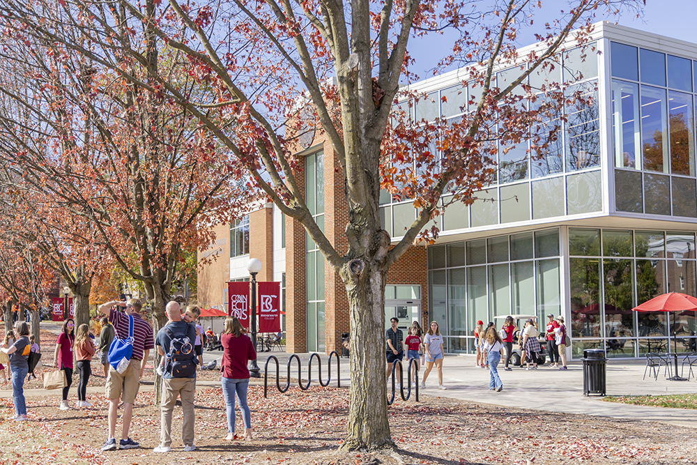 The outside of the F-L-C during homecoming with fall leaves