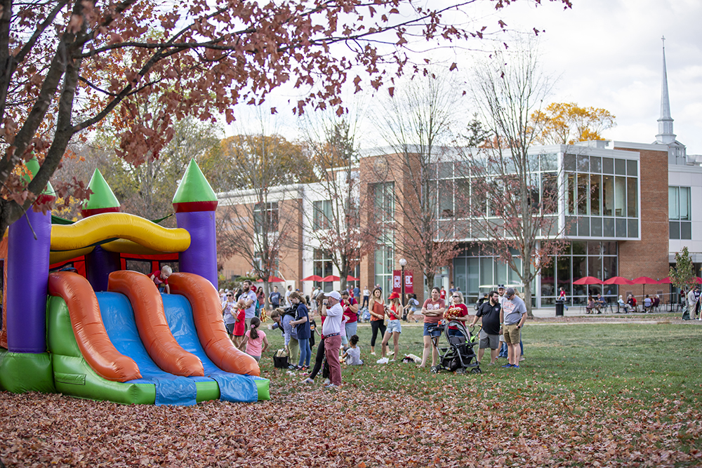 Bounce house on campus mall during homecoming festival