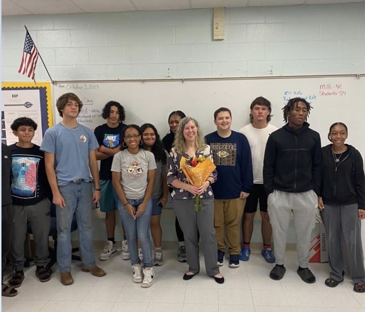 Cheri-Fines-Mills pictured with students at Culpeper County High School