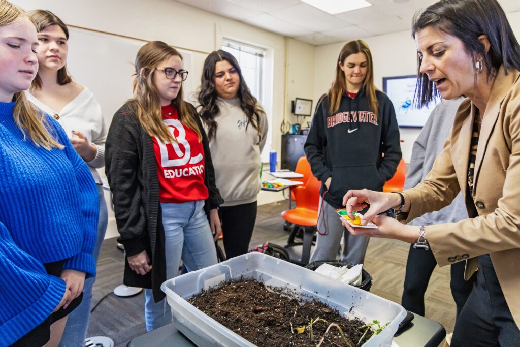 Students participate in a pill bug lesson.