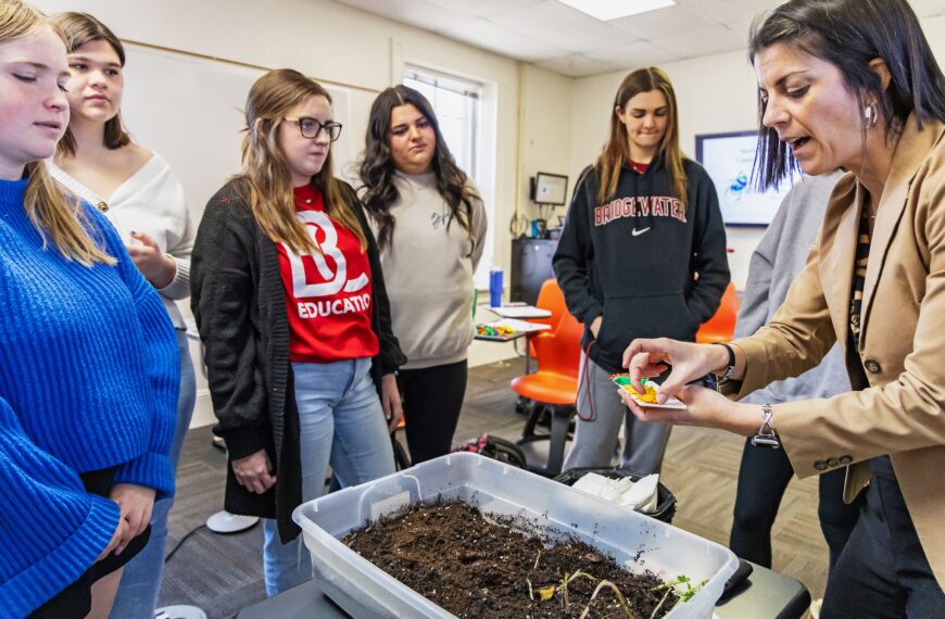 Students participate in a pill bug lesson.