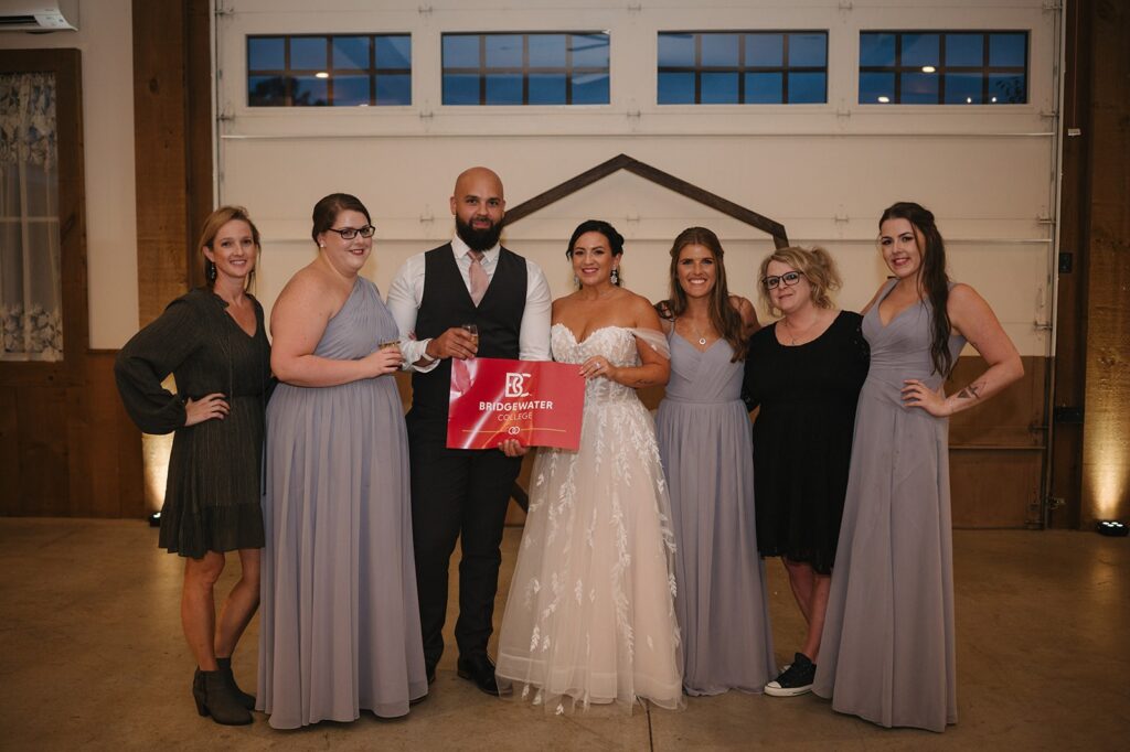 Stacey Scott and husband Matthew Sosa at their wedding pictured with fellow B-C alumni 