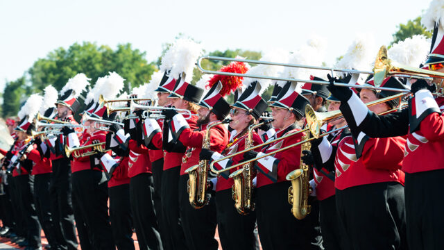 Screamin' Eagles Marching Band lined up playing instraments