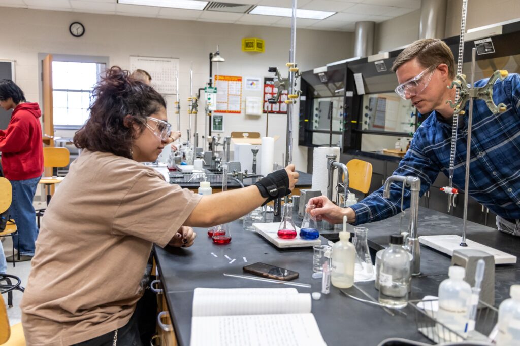 Professor and student in lab