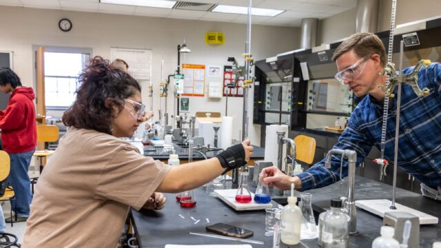 Professor and student in lab