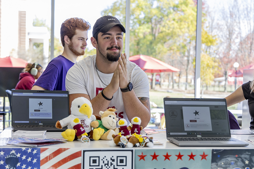 Tony Nesselrodt Jr. ’24 sitting at voter registration event 