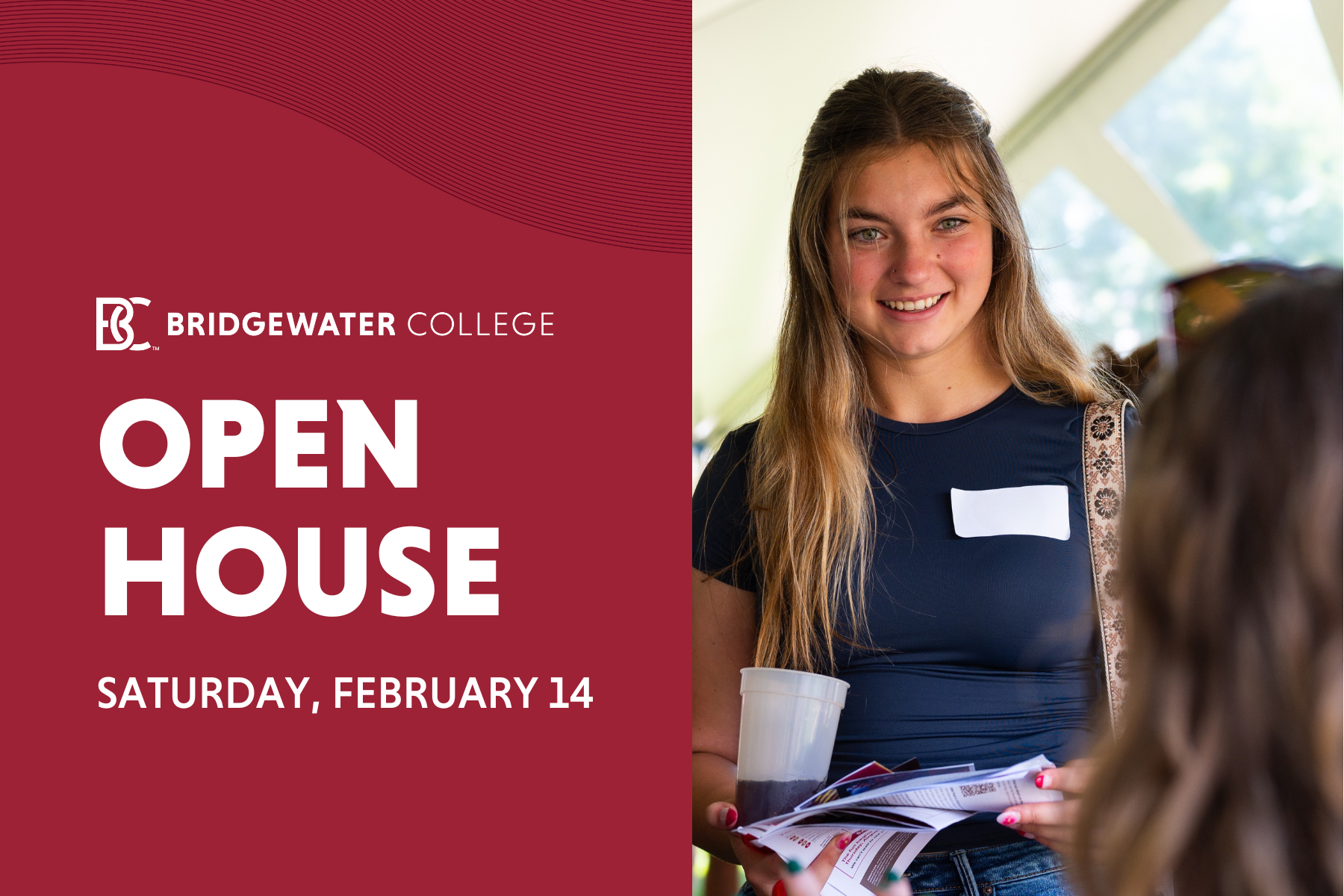 Bridgewater College. Open House. Saturday, February 14. Female student listening intently and smiling.