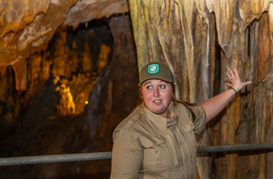 Hayley Savage giving a tour of Grand Caverns